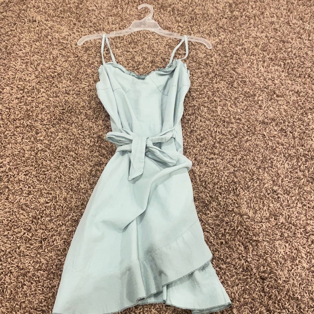 Blue Green Dress fits like a size Medium. Wrap dress